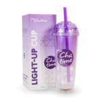 purple box in the background that says light-up cup then the product of the cup is displayed in front of the box with reusable cup with dome shaped lid and straw