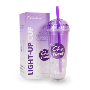 purple box in the background that says light-up cup then the product of the cup is displayed in front of the box with reusable cup with dome shaped lid and straw